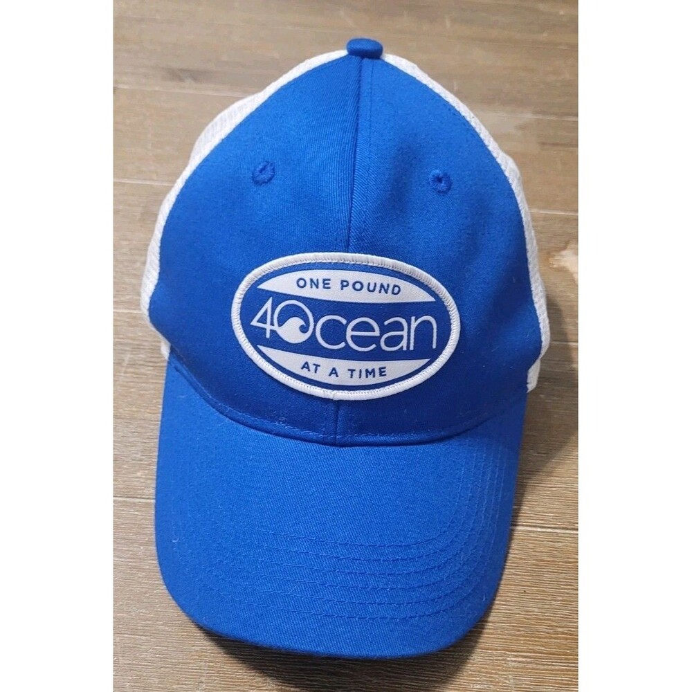 One Pound At A Time 4Ocean Blue Cap Hat Oval Patch Pulling Plastic From Ocean